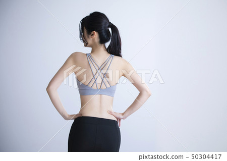 Young woman exercise 50304417