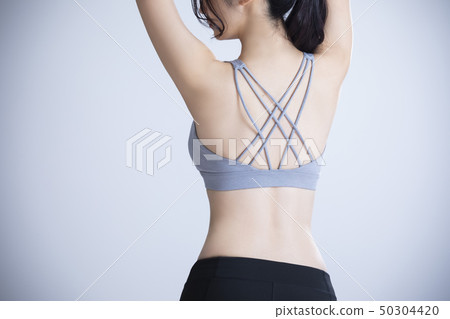 Young woman exercise 50304420