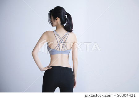 Young woman exercise 50304421