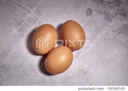 orange eggs of farm chicken 50306505