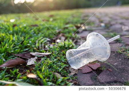 PVC cups litter at park pose environment issue PVC cups litter at park pose environment issue 50306676