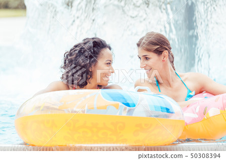 Smiling woman looking at each other 50308394