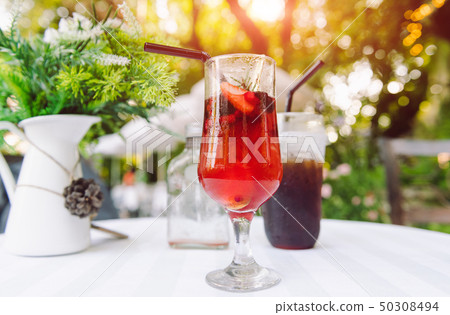 Ice cold berry fruit tea drink. 50308494