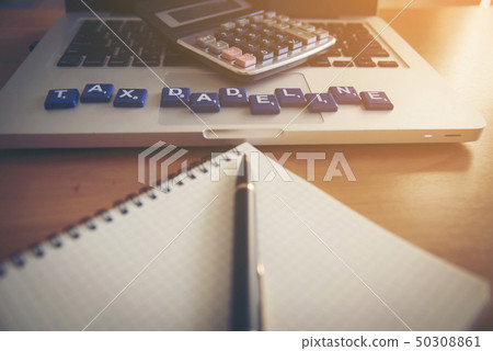 Tax planner word on notebook paper 50308861