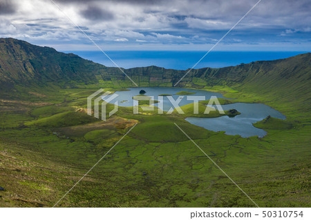 Aerial view of volcanic crater (Caldeirao) with a Aerial view of volcanic crater (Caldeirao) with a 50310754