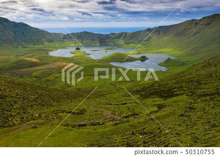 Aerial view of volcanic crater (Caldeirao) with a Aerial view of volcanic crater (Caldeirao) with a 50310755