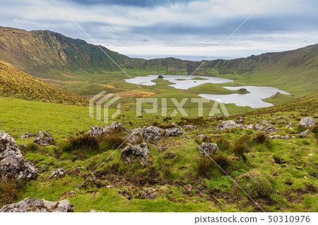 Volcanic crater (Caldeirao) with a beautiful lake Volcanic crater (Caldeirao) with a beautiful lake 50310976