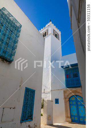 Cityscape with typical white blue colored houses 50311156
