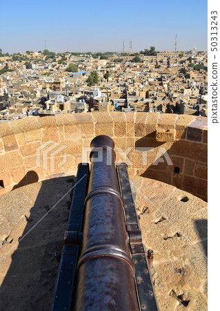 Cityscape seen from Jaisalmer Castle and Fort in the Jaisalmer World Heritage Site of India Cannons installed in the Fort 50313243