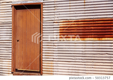 Vintage Timber Door In Corrugated Iron Wall 50313757