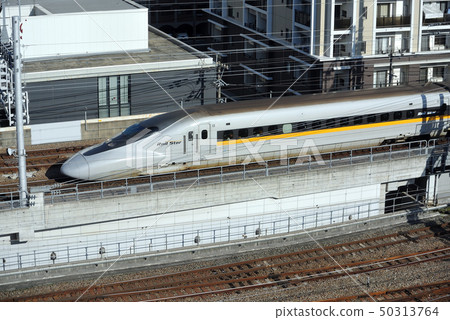 Hikari Rail Star running near Hakata Station 50313764