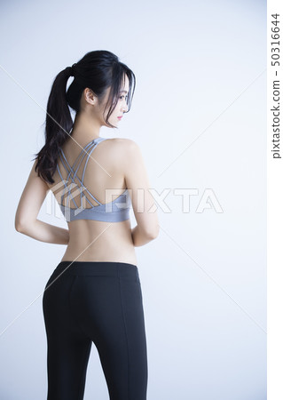 Young woman exercise 50316644