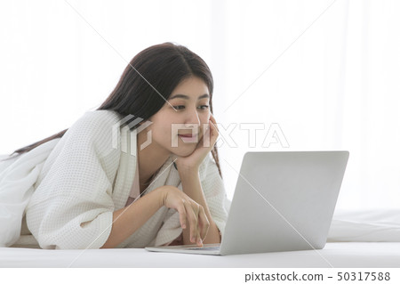 woman in bedroom 50317588