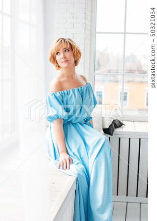Young charming smiling blonde short hair woman in Young charming smiling blonde short hair woman in 50321034