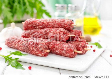 Raw lula kebab on skewers 50324114