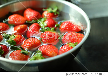 strawberry red fruit cleaning water 50324835