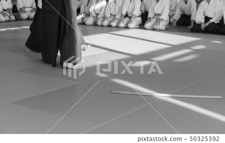People in kimono on martial arts weapon training seminar People in kimono on martial arts weapon training seminar 50325392