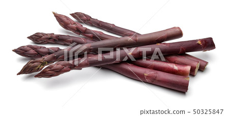 Purple asparagus sticks isolated on white 50325847