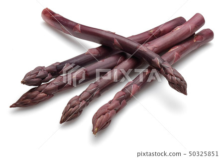 Purple asparagus sticks isolated on white 50325851