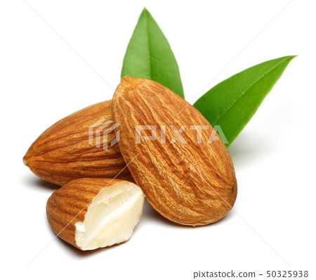 Group of almonds with leaves isolated on white 50325938