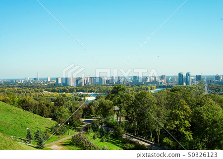 View of the Dnieper and the left bank with high rises from the hills of the Kyiv Pechersk Lavra 50326123