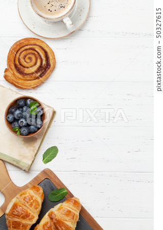 Coffee and croissants breakfast Coffee and croissants breakfast 50327615