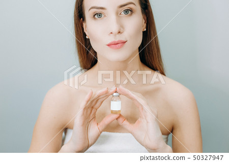 woman beautiful skin drug bottle youth liquid woman beautiful skin drug bottle youth liquid 50327947