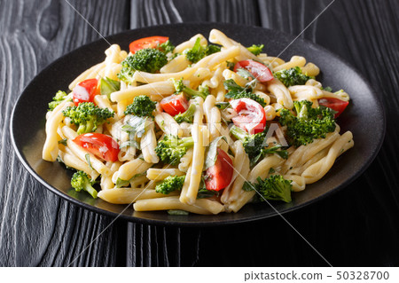 portion of Casarecce pasta with vegetables, herbs, 50328700