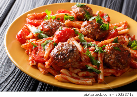 meatballs with a side dish of pasta Casarecce in 50328712