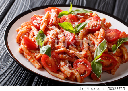 Casarecce pasta with spicy tomato sauce, parmesan Casarecce pasta with spicy tomato sauce, parmesan 50328725