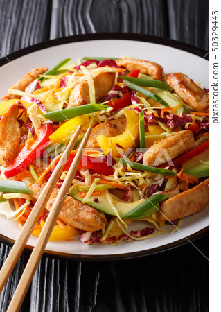 Delicious coleslaw salad with chicken, avocado and 50329443