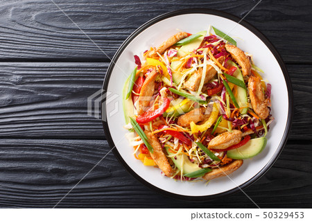 Asian cabbage salad with chicken and vegetables Asian cabbage salad with chicken and vegetables 50329453