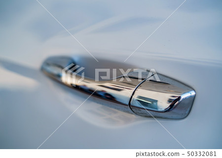 Modern car door handle with corrosion on it close Modern car door handle with corrosion on it close 50332081