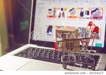 Shopping online concept - Parcel or Paper cartons Shopping online concept - Parcel or Paper cartons 50334227