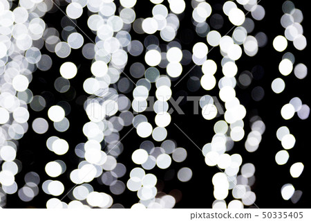 Abstract bokeh of white lights on black 50335405