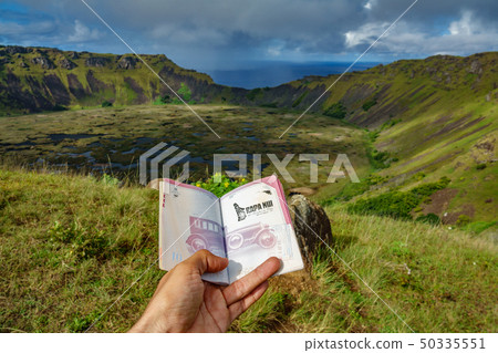 Passport, hand, Rapa Nui Stamp and Rano Kau volcano Passport, hand, Rapa Nui Stamp and Rano Kau volcano 50335551
