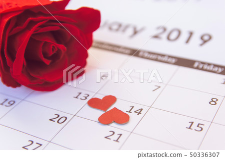 Valentines day. Red rose and red hearts on Valentines day. Red rose and red hearts on 50336307