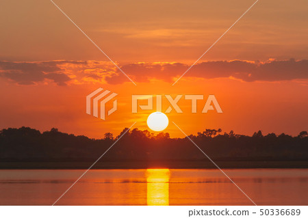 Sunset in the lake. beautiful sunset behind the Sunset in the lake. beautiful sunset behind the 50336689