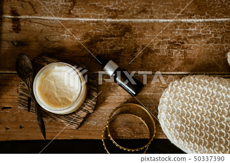 Natural SPA cosmetics on wooden table overhead 50337390