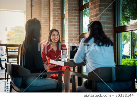 Women having a coffee in the bar Women having a coffee in the bar 50338144