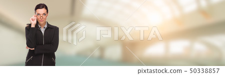 Serious Mixed Race Businesswoman Inside Building Serious Mixed Race Businesswoman Inside Building 50338857