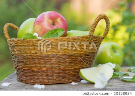 Fresh sweet juicy red and green apples with 50338924