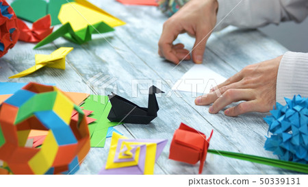 Origami paper swans. 50339131