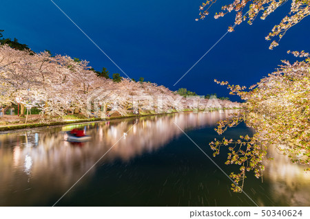 A lighted up view of the "Hirosaki Castle Saijo" from the Haruyo Bridge A lighted up view of the "Hirosaki Castle Saijo" from the Haruyo Bridge 50340624