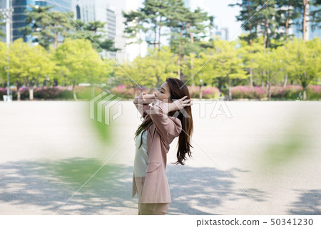 Business woman working in the city Business woman working in the city 50341230