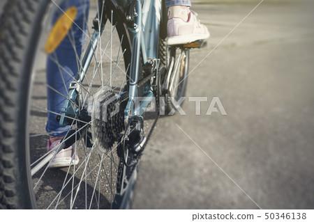 Closeup of a bicycle gears mechanism and chain on 50346138