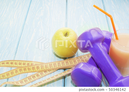 The concept of a healthy diet. Small dumbbells, The concept of a healthy diet. Small dumbbells, 50346142