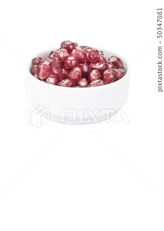pomegranate seeds on white background pomegranate seeds on white background 50347081