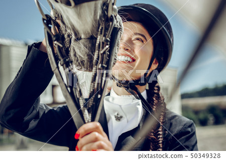 Cheerful nice woman expressing her positive emotions 50349328