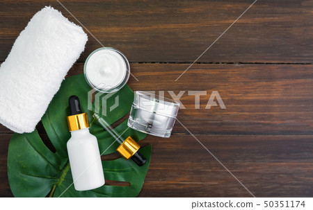 Cream bottle set and serum, mockup of beauty. 50351174